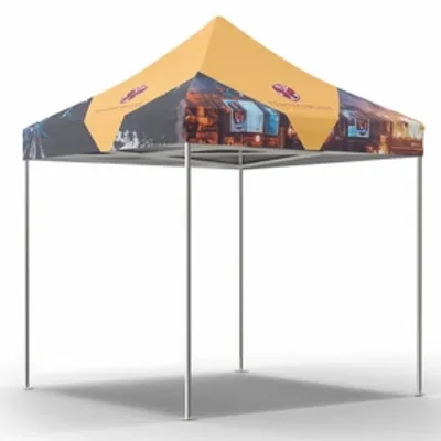 Canopy Topper & Frame A custom-printed trade show tent with images on the valance and peak, standing in a plain white space.